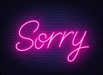 Sorry neon sign on brick wall background