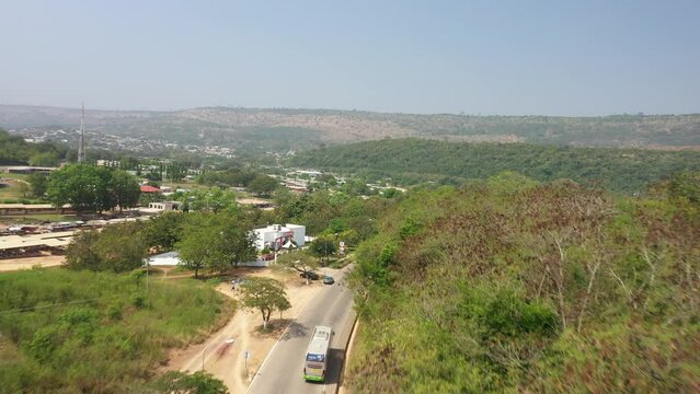 Bus on road moving into township ( Akosombo)
