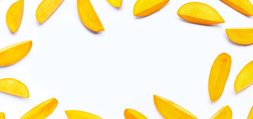 Tropical fruit, Frame made of mango slices on white background. Top view