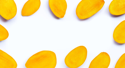 Tropical fruit, Frame made of mango slices on white background. Top view