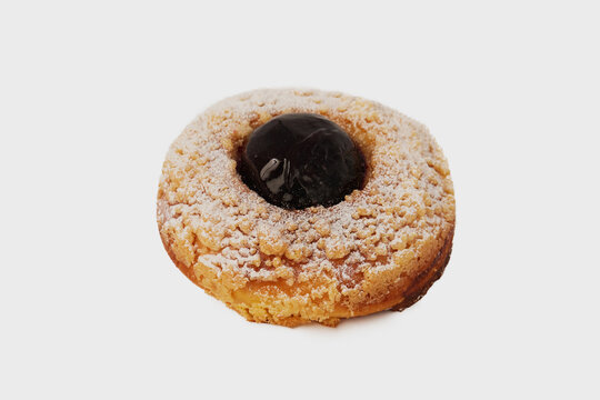 Top view image of cider doughnut with jam isolated at white background.