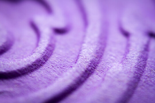 Extreme macro of embossed purple paper