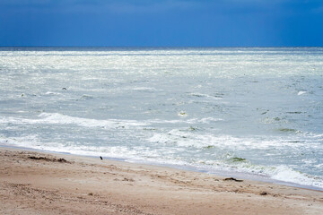 Sand beach and waves
