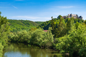 Fototapeta na wymiar View over the river Nahe with the castle of Ebernburg/Germany in the background