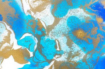 Alcohol-based ink texture in blue tones with gold.
