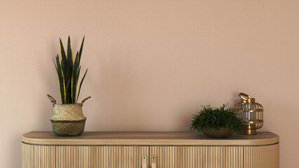 Interior wall mockup in minimalist style with light biege wooden console or sideboard, with golden...