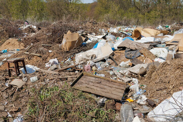 A view of the landfill. Garbage dump. A pile of plastic rubbish, food waste and other rubbish....