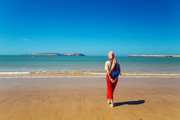 Girl on the coast of the Atlantic Ocean.