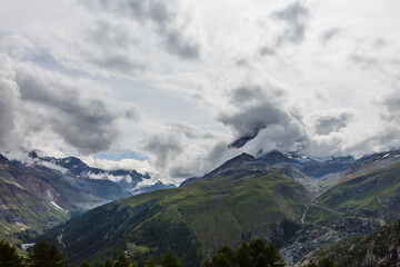 Obraz na płótnie Canvas panorama mountains with clouds, switzerland