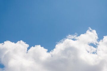 Big white clouds on clear blue sky, copy space
