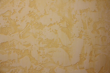 Vintage background with the texture of Venetian plaster. Spectacular orange grunge.