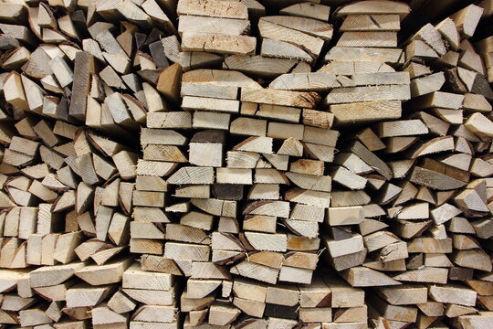 Background of horizontally arranged wooden boards. Harvesting firewood for the winter. Preparation for the heating season in Europe.