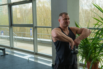 Naklejka premium Worth weightlifting weight lifting legs lower kettlebell free strength glutes, for gym grunge in sport from outside holding, background floor. Dumbbells black,