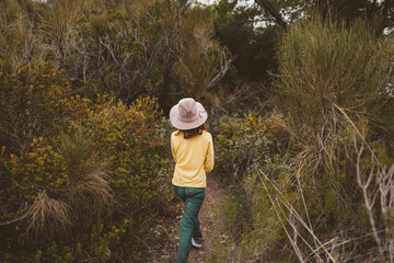 Naklejka na ściany i meble Little girl on a trek in nature, Spain 