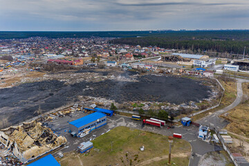 The aerial view of the destroyed and burnt buildings. The buildings were destroyed by russian rockets and mines. The Ukrainian cities after the russian occupation.