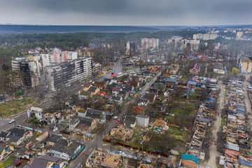 The aerial view of the destroyed and burnt buildings. The buildings were destroyed by russian rockets and mines. The Ukrainian cities after the russian occupation.