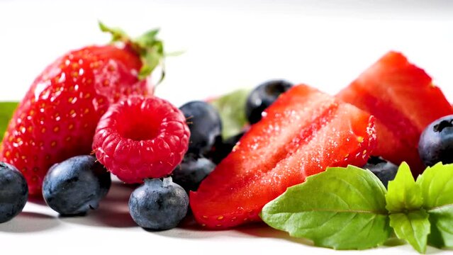 fresh berries fruits-strawberry, blueberry and raspberry on white background