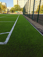 Artificial grass soccer field. Corner kick line of ball and a soccer field , football field ,...