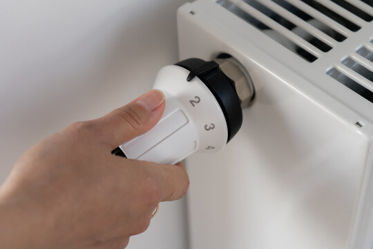 The white thermostat for adjusting the temperature of the central heating radiator is set to the off position.
