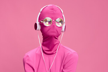 Creative crazy pink photo on a pink background with pink clothes and accessories, cyberpunk concept...