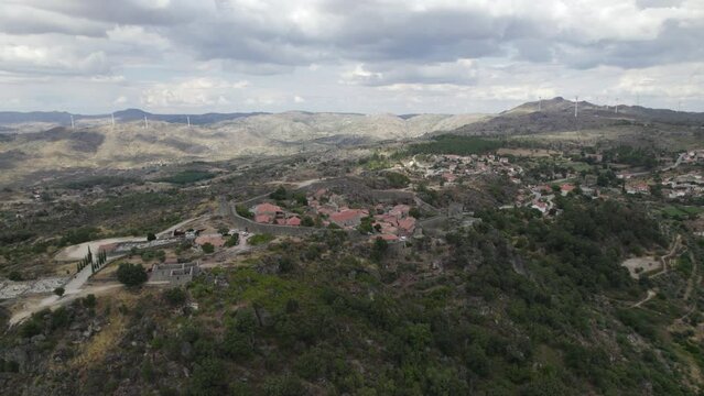 Wide angle aerial view of medieval hilltop Sortelha Castle, Portugal