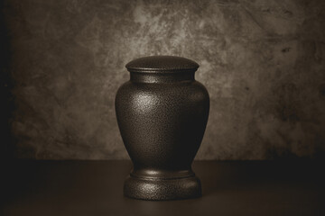 Cremation urn with sepia toning