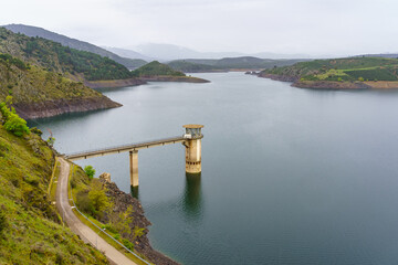 Control and surveillance tower of the water reserve reservoir of Madrid, Atazar, Spain.