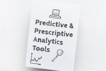 Concept Predictive Prescriptive Analytics Tools. Text on a piece of paper with icons.