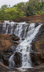 waterfall in the mountains, Kanthanparai Waterfalls, Wayanad, Kerala, India.