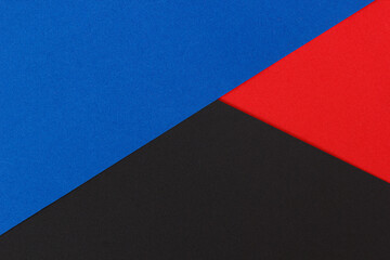 Black, blue and red color paper background
