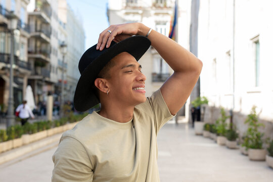 Happy Hispanic man in hat