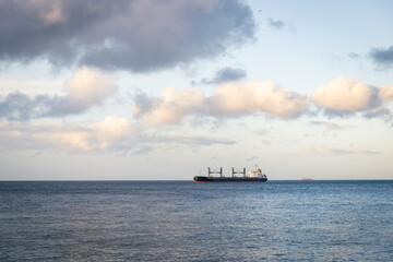 Fototapeta na wymiar Ship in the sea on the horizon