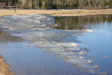 In spring, beautiful lake in the Canadian forest in the province of Quebec