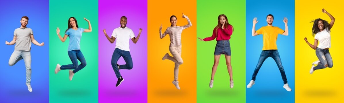 Happy multiethnic millennials grimacing and gesturing on colorful backgrounds © Prostock-studio