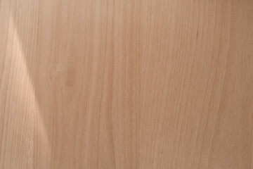 Top view flat lay background with organic shadows, light, bokeh, and texture on a wooden background. Minimal summer lights and shadow concept.