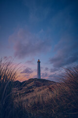 Famous lighthouse lyngvig fyr at the danish coast bevfore sunrise. High quality photo