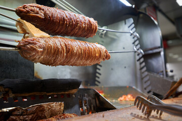 Turkish Street Food Kokorec. Mutton with Sheep bowel cooked in brazier.