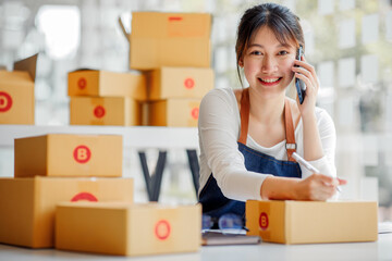 SME entrepreneur Small business entrepreneurs Online selling ideas, Happy Asian business work on...