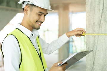 Builder inspection consultancy. Inspector checking material and structure in construction.