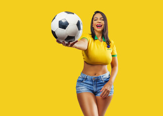  Portrait of beautiful smiling brazilian girl with soccer ball