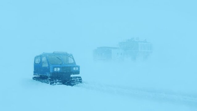 Arctic Landscape With Snowcat And Research Station