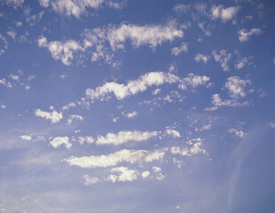Scattered white clouds in the sky