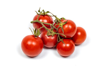 fresh cherry tomatoes on the vine isolated o a white background