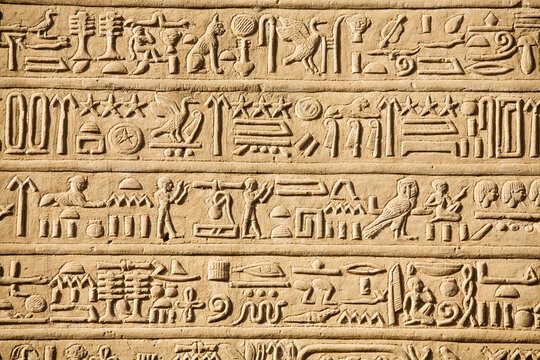 Egypt, Hieroglyphics carved into wall of Temple of Horus and Sobek at ancient ruins of Kom Ombo on Nile River