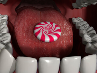 Close up of the human mouth and human tongue with candy on it