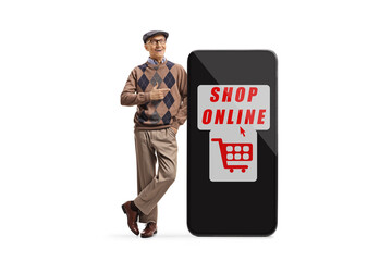 Full length portrait of a senior man smiling and pointing to a big smartphone with text shop online