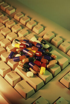 Medical capsules on a computer keyboard
