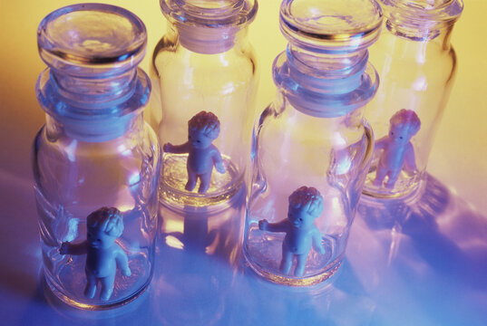 Miniature dolls in bottles