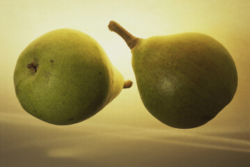 Close-up of two pears