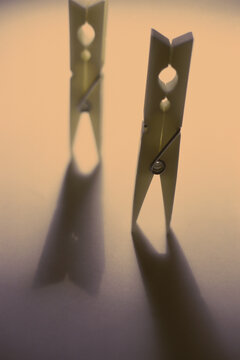 Close-up of two clothespins